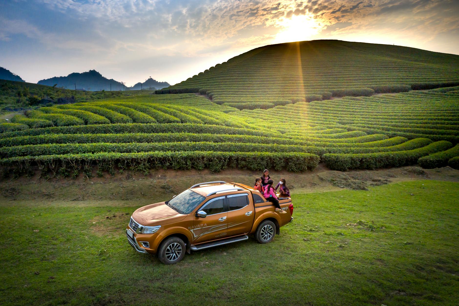 Healthy family reviewing life insurance options on laptop